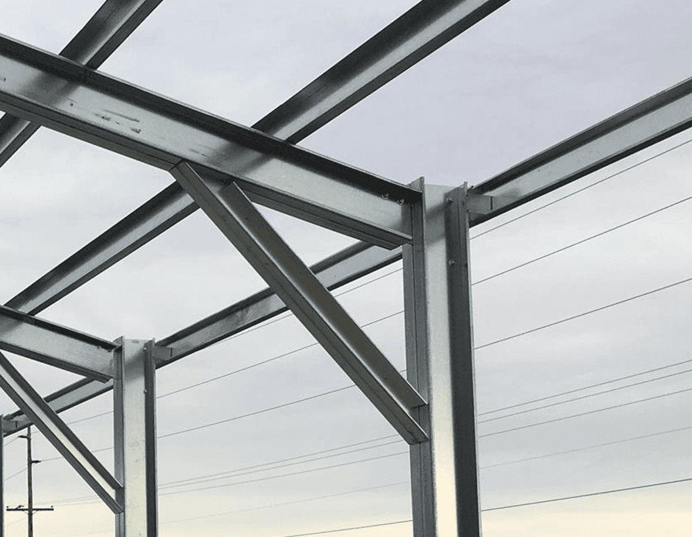 Cold-formed steel building frame using bolted C-channel members, ideal for light to mid-size structures with efficient assembly.