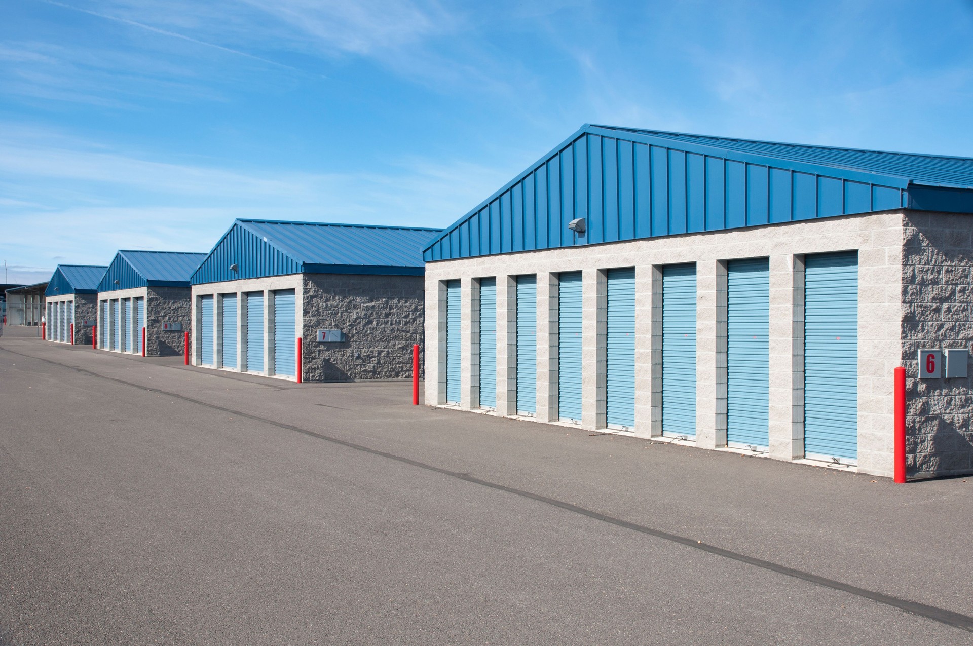 Exterior of blue and tan storage units